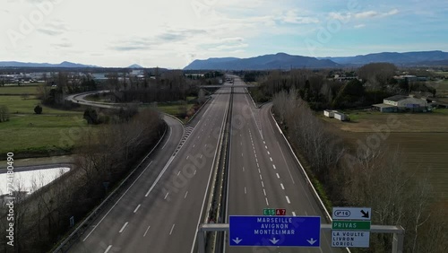 Loriol sur Drome, France - January 27, 2024: Empty A7 Sunny Motorway in France. Farmers' Protest, Tires, Tractors, Agricultural Machines on the Highway, completely blocking road traffic. photo