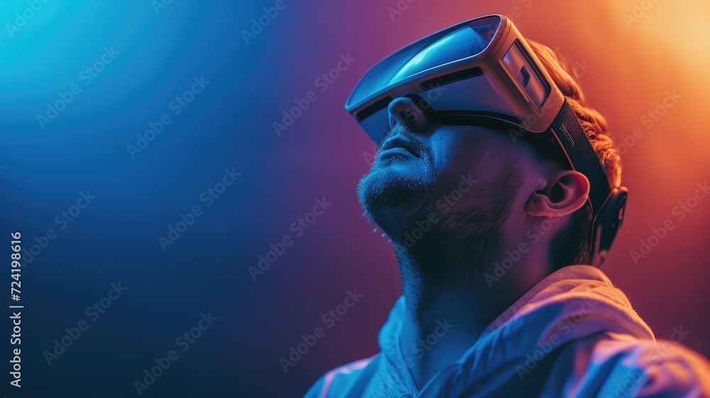 Young man wearing virtual reality goggles. Future technology and entertainment concept. Young man wearing virtual reality goggles. Future technology and entertainment concept.