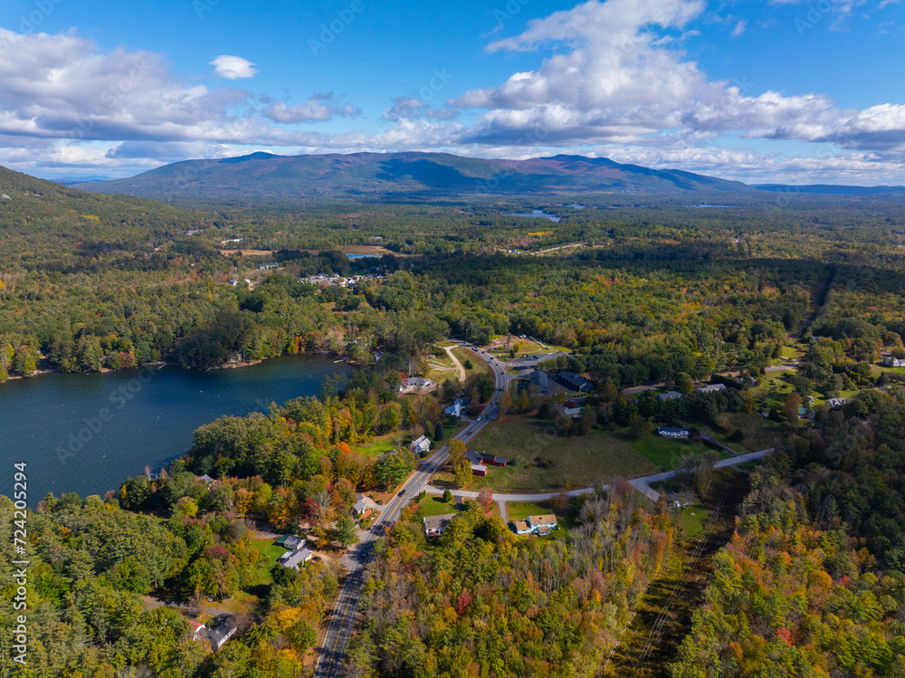 Ossipee Mountains aerial view in fall from top of town of Moultonborough, New Hampshire NH, USA. 