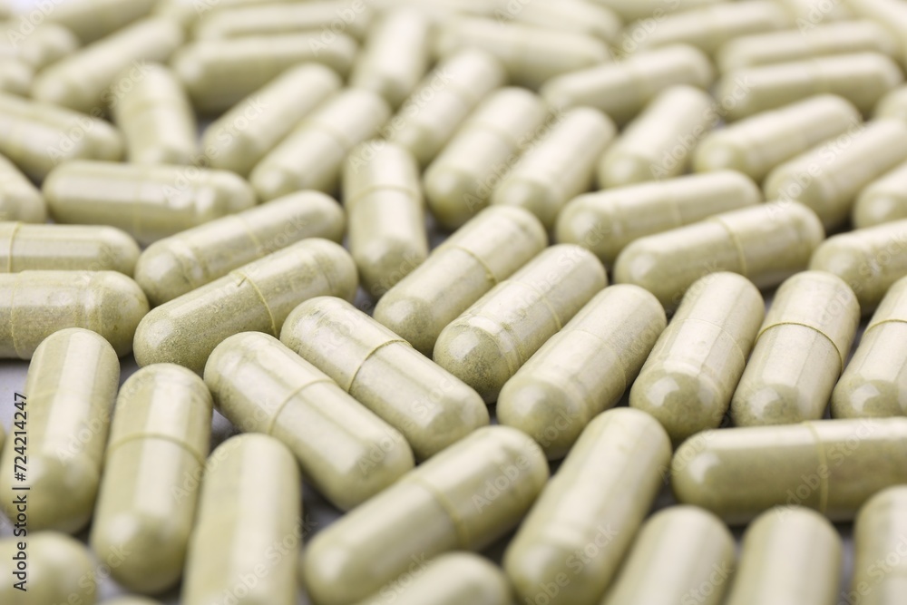 Many vitamin capsules as background, closeup view Many vitamin capsules as background, closeup view