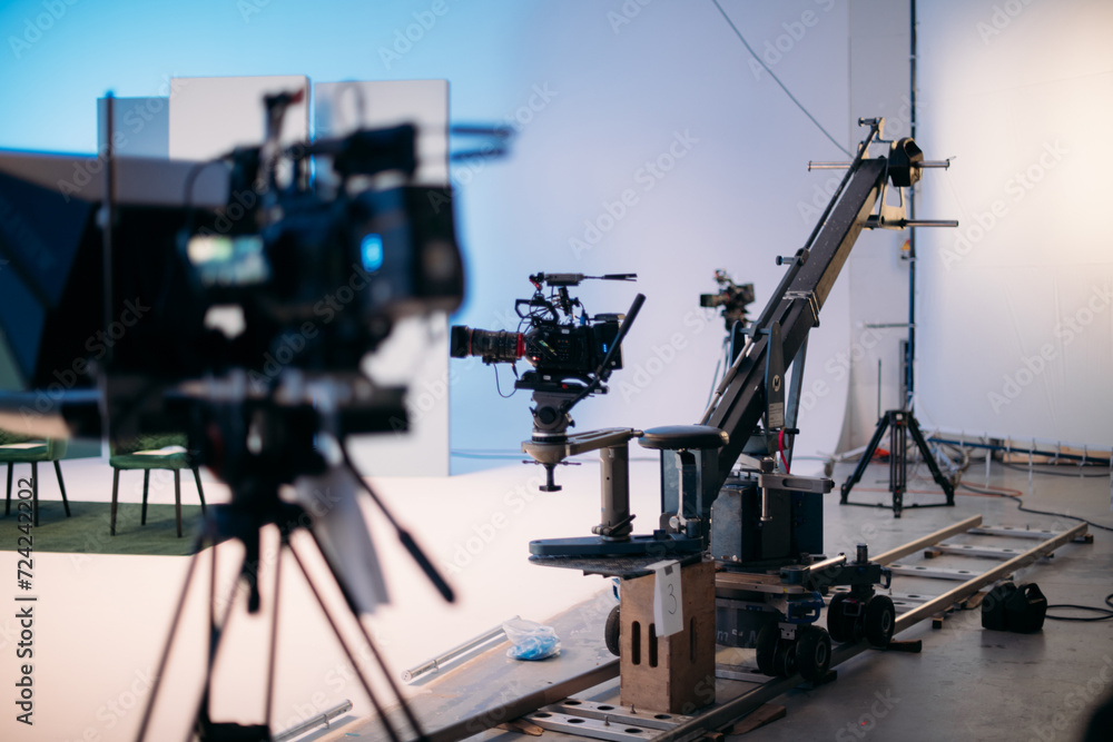 Film set, monitors and modern shooting equipment. Film crew, lighting devices, monitors, playbacks - filming equipment and a team Film set, monitors and modern shooting equipment. Film crew, lighting devices, monitors, playbacks - filming equipment and a team