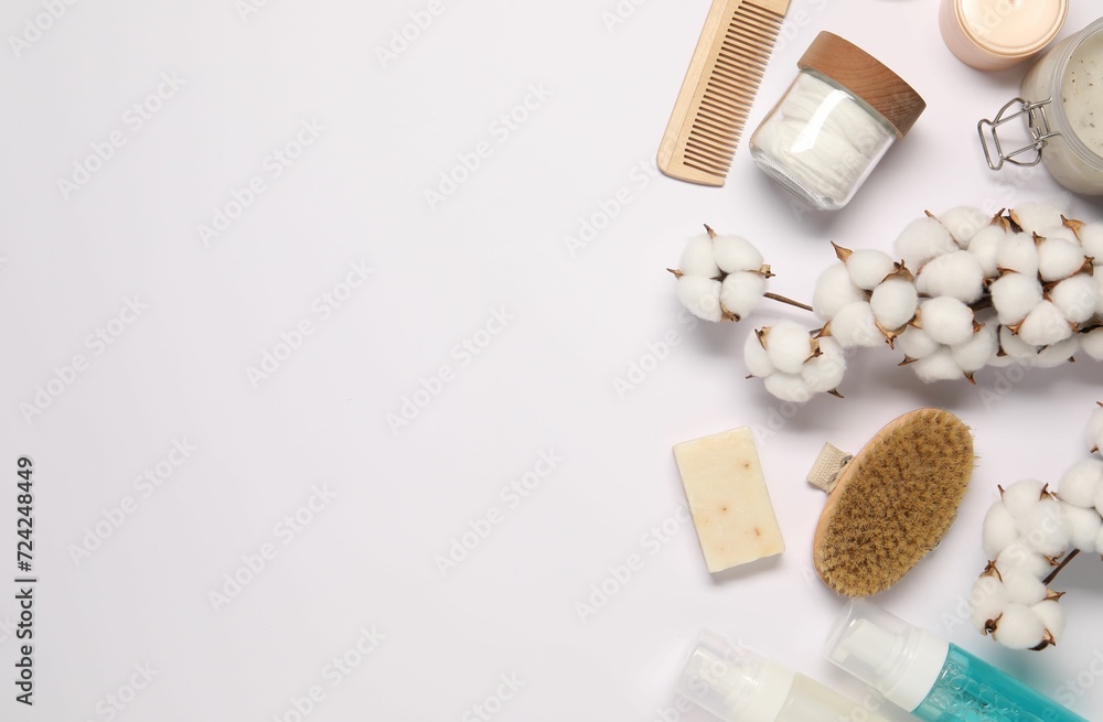 Bath accessories. Flat lay composition with personal care products on white background, space for text