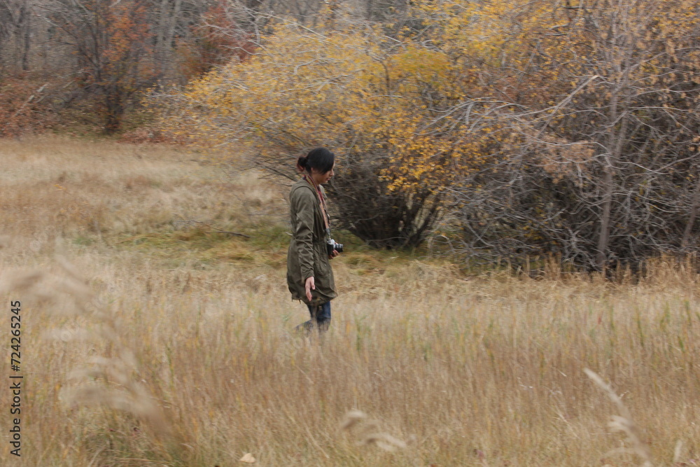 woman walking in the meadows