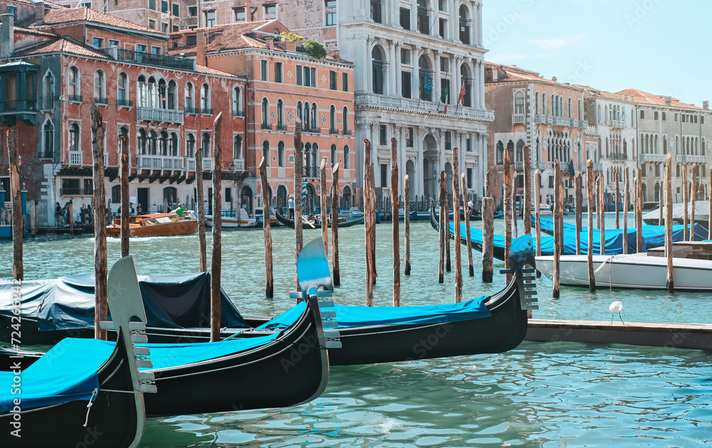 A beautiful canal with boats in Venice, Italy