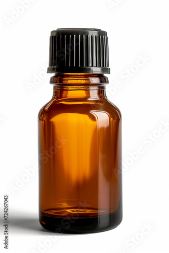 A brown bottle of aromatherapy essential oil on white background