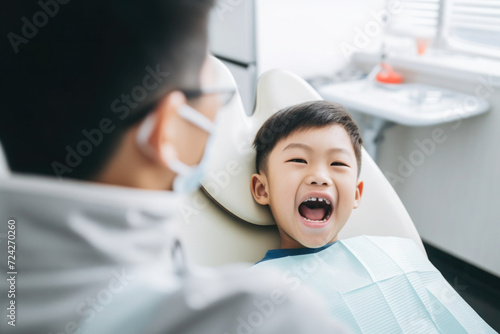 Chinese boy visiting dentist  yearly checkup 