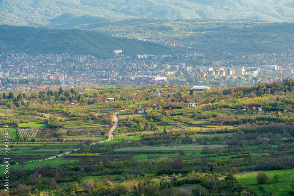 View from the top of the mountain on the city of Nis and the road that leads from the mountain to the city. The view is from the Kamenički vis picnic area, which is located near the city of Niš.