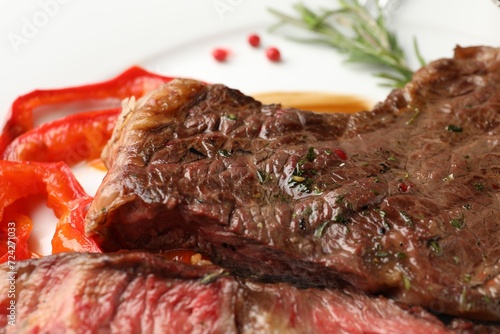 Delicious grilled beef steak with spices, closeup