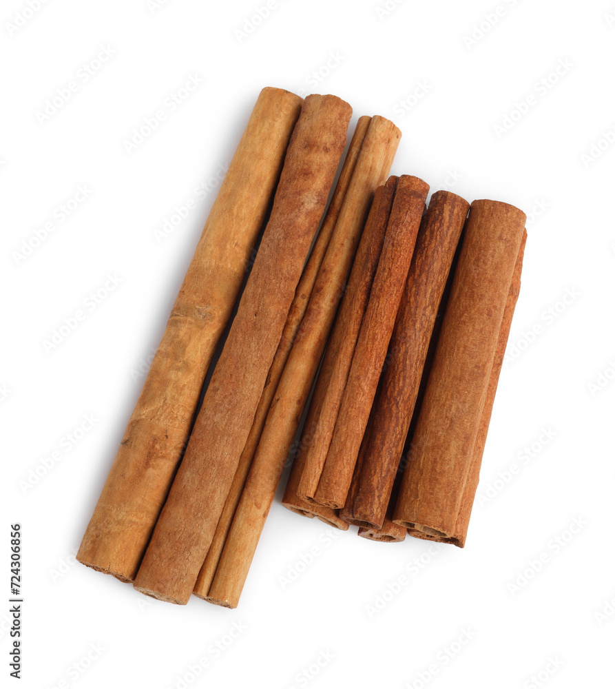 Dry aromatic cinnamon sticks isolated on white, top view Dry aromatic cinnamon sticks isolated on white, top view