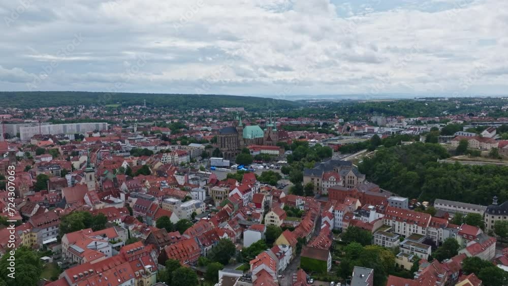 Aerial drone view of Erfurt Cathedral and St. Severi church in Erfurt , Germany . Hilltop Romanesque and Gothic style Roman Catholic place of worship with ornate stained glass windows. Aerial drone view of Erfurt Cathedral and St. Severi church in Erfurt , Germany . Hilltop Romanesque and Gothic style Roman Catholic place of worship with ornate stained glass windows.