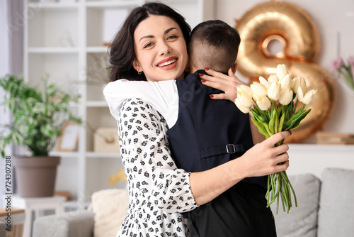 Beautiful woman with tulips...