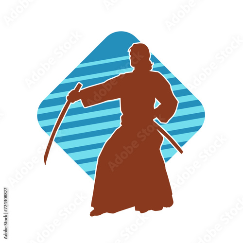 Silhouette of a sword warrior in action pose. Silhouette of a martial art person carrying sword weapon. Silhouette of kendo martial art pose.
