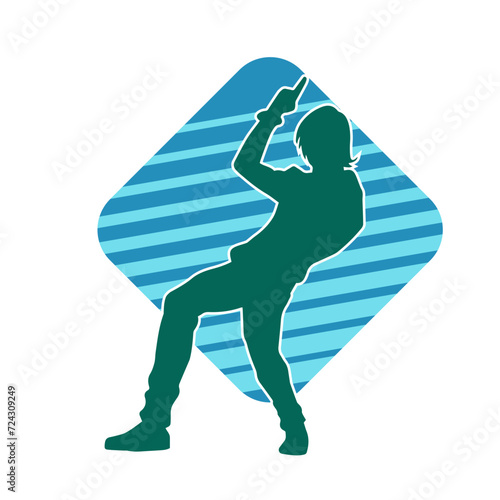 Silhouette of a male dancer in performing pose. Silhouette of a dancing man.