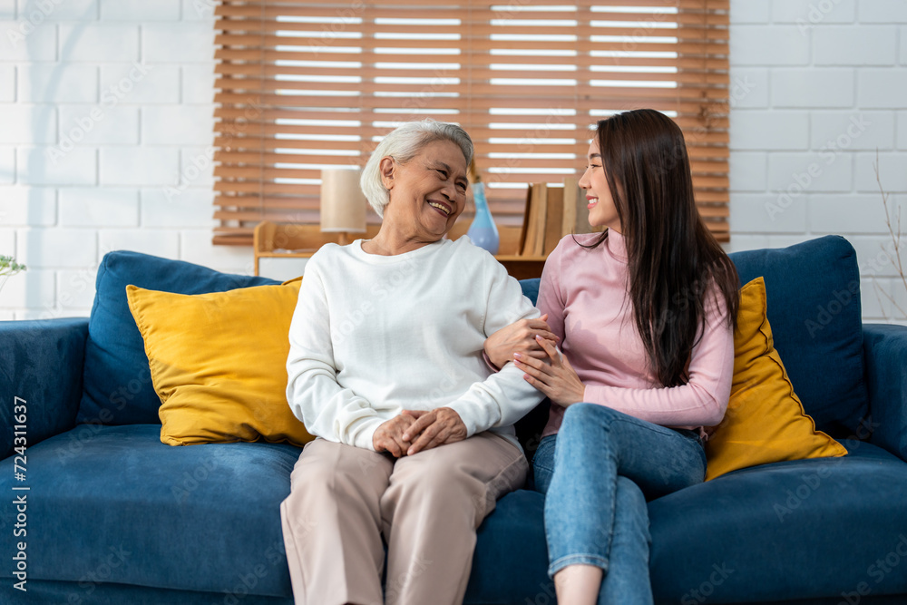Asian lovely family, young daughter talking and sit with senior mother. Asian lovely family, young daughter talking and sit with senior mother.