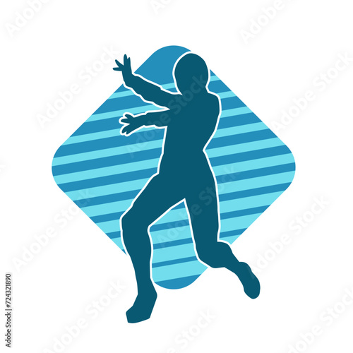 Silhouette of a man in oriental martial art pose. Silhouette of a male in martial art move.