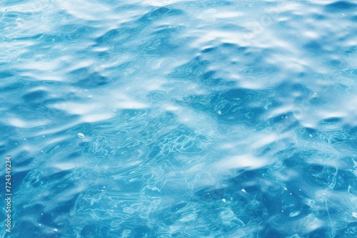 A detailed view of intensely blue water, capturing its striking color and texture.
