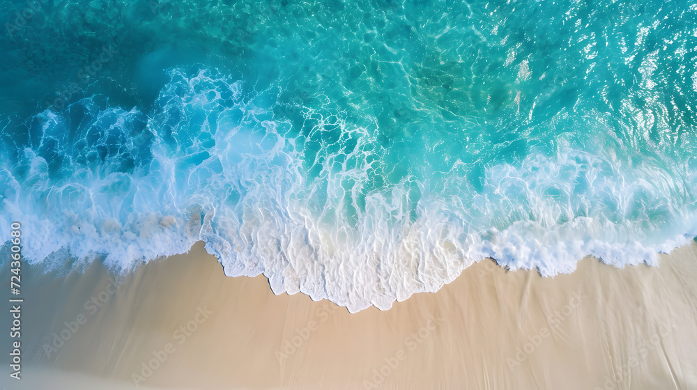 Beautiful tropical beach along the coastline with waves, Aerial drone view of sandy beach.	