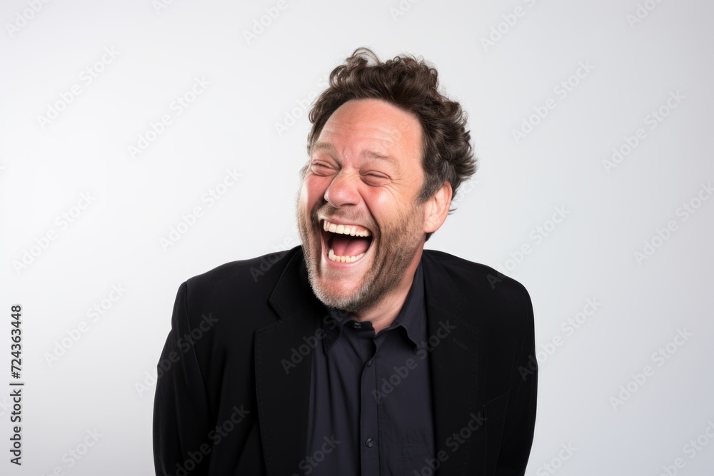 Handsome man shouting over white background. Looking at camera. Handsome man shouting over white background. Looking at camera.