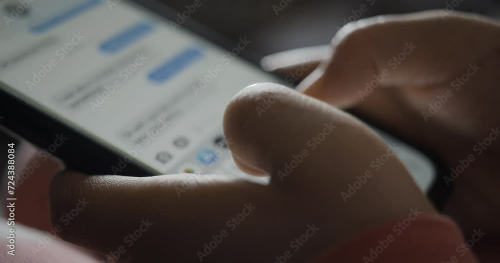Close-up of Child's Hands Typing in Messaging App on Smartphone