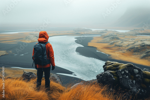 Wanderlust explorer discovering Icelandic. Tired Man traveler in mountains with backpack.