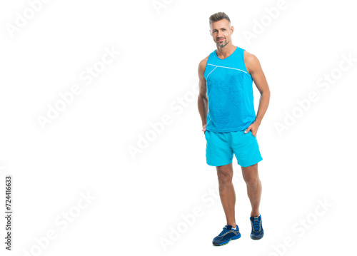 sport athlete with fit body isolated white, copy space. Sport and healthy lifestyle. full length of athlete. athlete wearing sport wear standing alone. The male sport athlete posing on studio