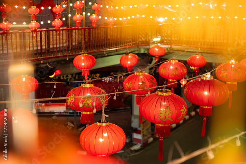 Photography The beauty of many red Chinese lanterns with inscriptions to bring good luck in the cultural celebration of Chinese New Year
