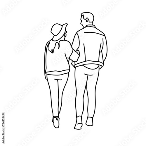 Deux amoureus se balladent, bras dessous bras dessus