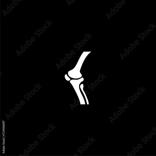 Knee bone icon isolated on dark background