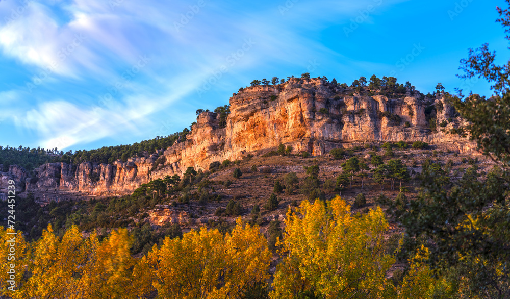 Autumn Colors Accenting Majestic Rocky Cliff Landscape