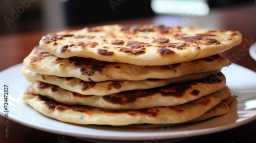 Stack of Flat Bread on White Plate