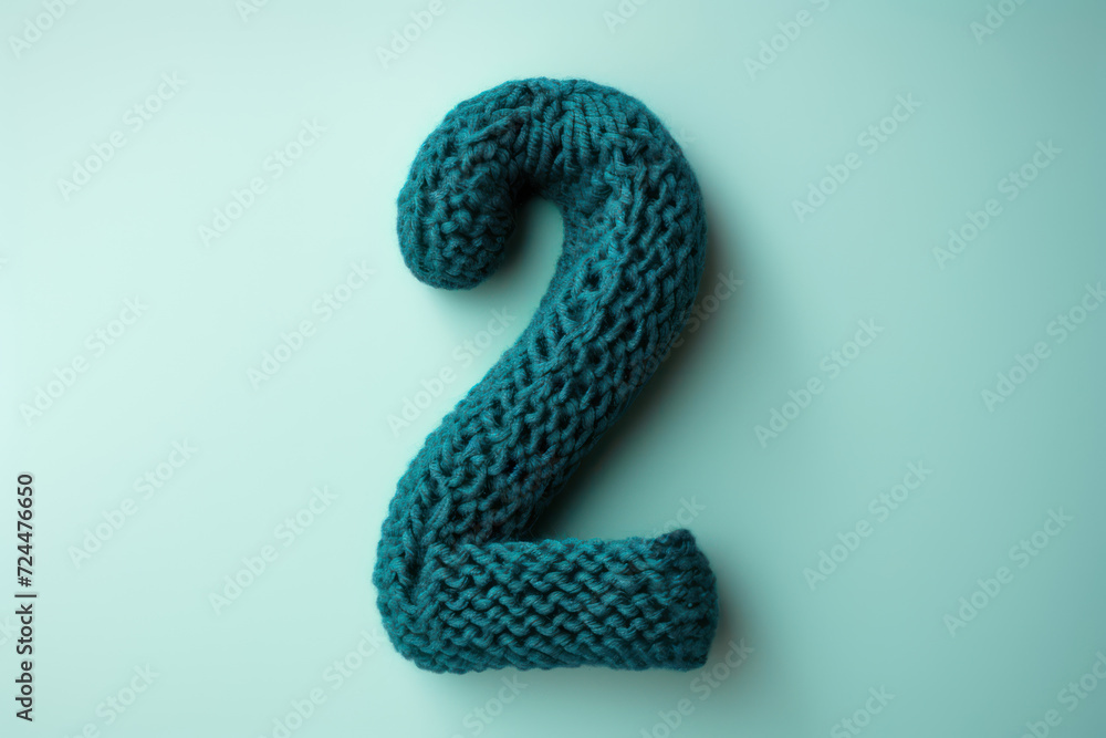Crocheted number 7 with rich teal wool, showcasing a sleek, modern look on a soft beige background
Crocheted number 7 with rich teal wool, showcasing a sleek, modern look on a soft beige background