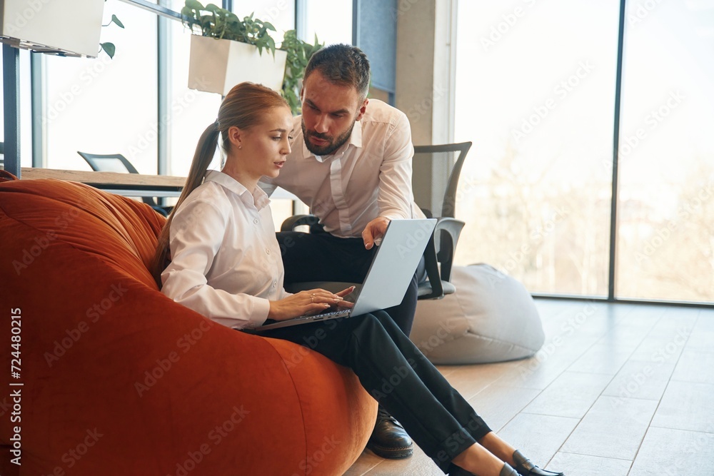 Man and woman employees are working in the office Man and woman employees are working in the office