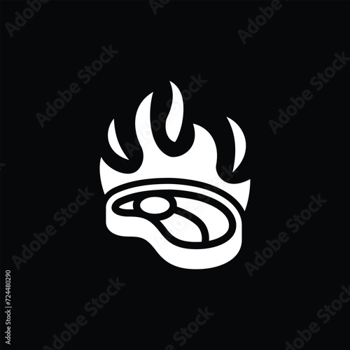burning meat on black 