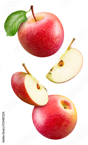 Red apple with apple slice and leaves isolated on a white background. Apple with leaves clipping path. Flying in air apple