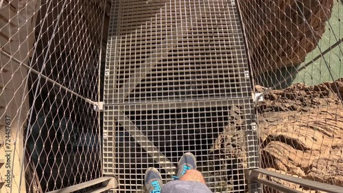 Man walking on a bridge at El Caminito del Rey (The King's Little Path), Spain