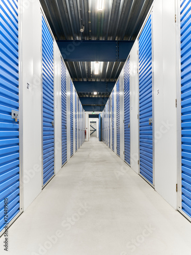 A corridor inside a self storage facility - portrait