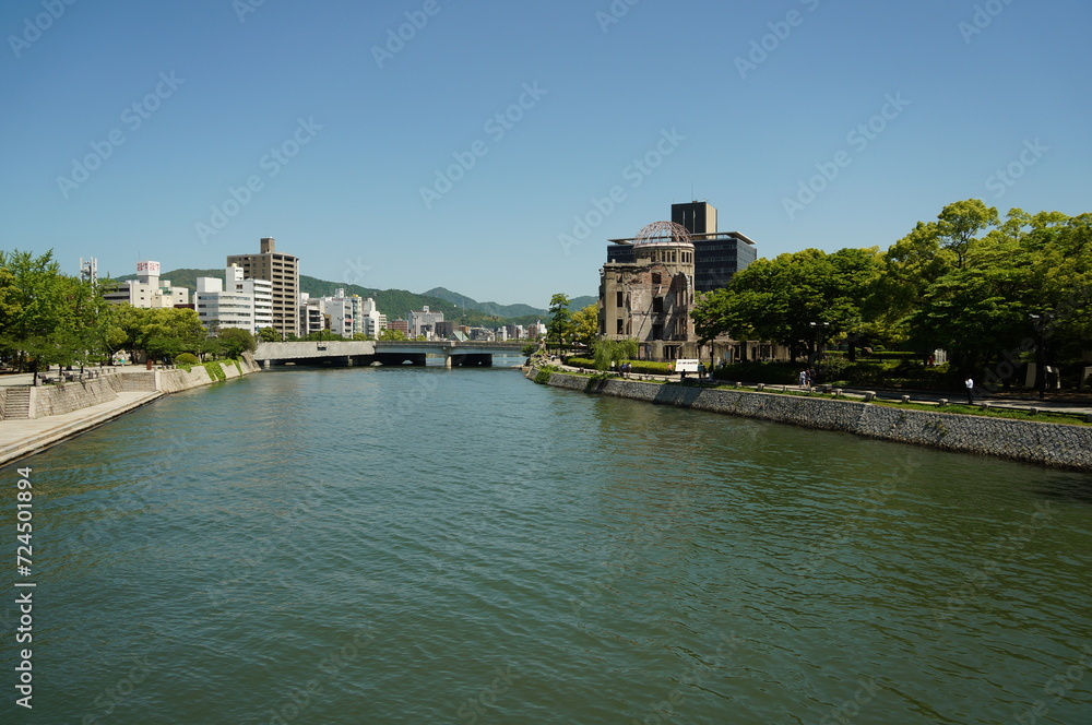 The Atomic Bomb Dome is located beside the Motoyasu River in Hiroshima, Japan.