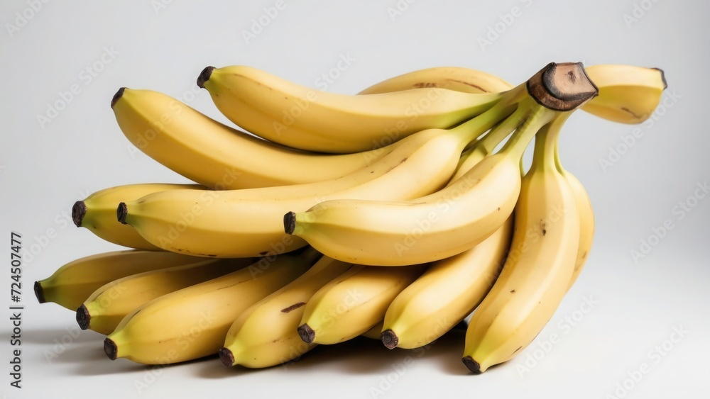 bunch of yellow bananas on white backgroun in close up photo