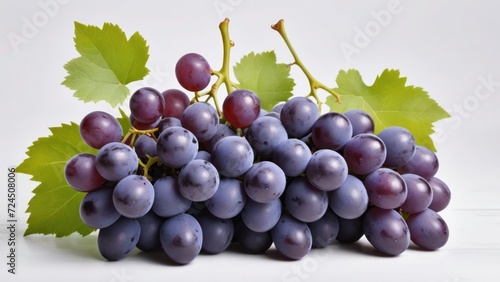 bunch of grapes and leaf isolated on white in close up photo