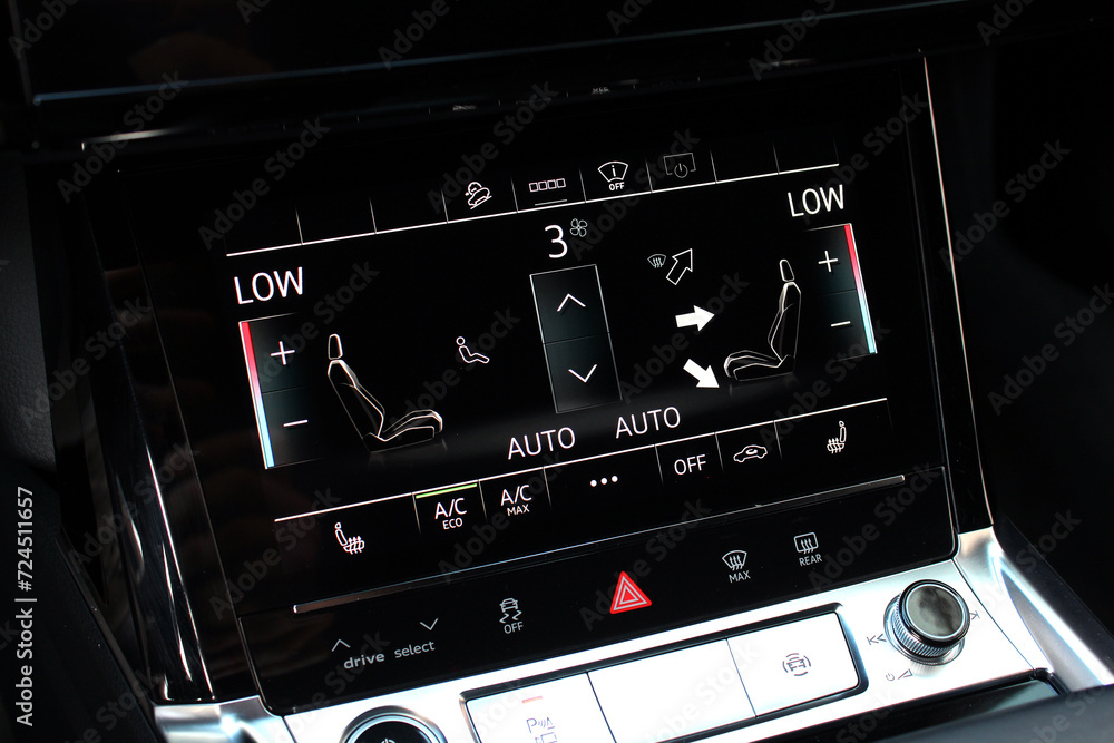 Electric car touch screen climate control. New SUV touch screen Air conditioning. Modern car touch screen climate control display for driver and passenger. Zone climate control. Electric car touch screen climate control. New SUV touch screen Air conditioning. Modern car touch screen climate control display for driver and passenger. Zone climate control.