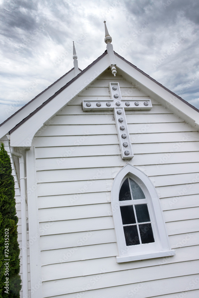 Cross with lightbulbs. Wooden church at Raglan Waikato New Zealand.