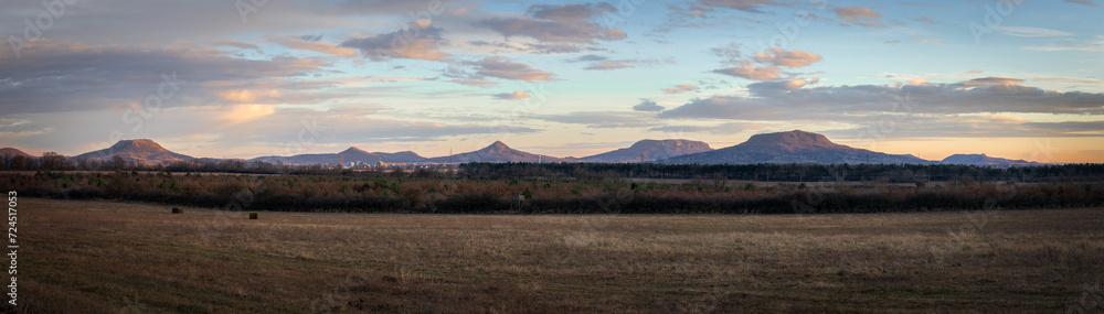 Idyllic panoramic view over the landscape at volcanoes, Hungary, near small town Tapolca, in the late afternoon sunlight Idyllic panoramic view over the landscape at volcanoes, Hungary, near small town Tapolca, in the late afternoon sunlight