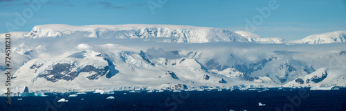 Low clouds hovering along the mountain range of the Antarctic Peninsula, Paradise Bay, Gerlach Straight, Antarctic Peninsula, Antarctica.