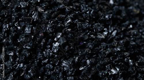 Macro close up of Silicon Carbide black sand size. Fine particle silicon carbide pile up, White background Isolated, particle element object photo