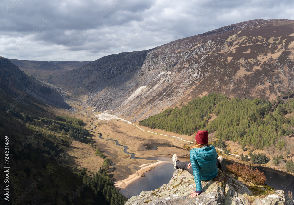 Woman climber in Glendalough Wicklow National Park. Woman climber in Glendalough Wicklow National Park.