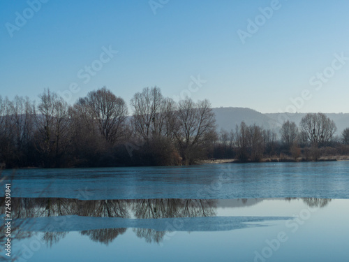 Tranquil Frozen Lake under Blue Sky - French Countryside - Burgundy