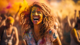 Portrait of a beautiful girl full of colored powder all over the body