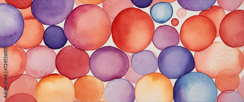 Watercolor circles of different colors. Mosaic of colorful water color circles, gradating from purple to red. photo