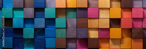 Colorful wooden blocks aligned. Wide format.