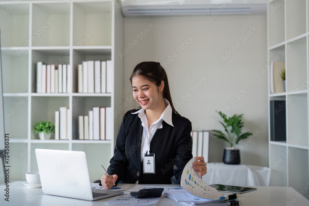 Business accounting woman counting on calculator working on financial document in hands closeup. Bookkeeping concept Business accounting woman counting on calculator working on financial document in hands closeup. Bookkeeping concept
